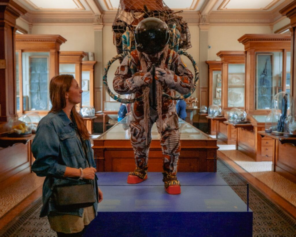 Visitors exploring unusual artefacts inside a quirky London museum