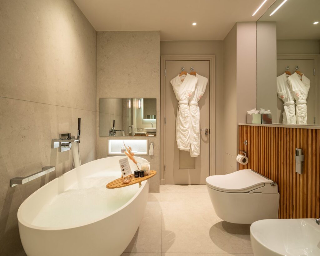 Luxury suite at The Prince Akatoki London featuring a deep soaking bath and elegant Japanese-inspired interior.